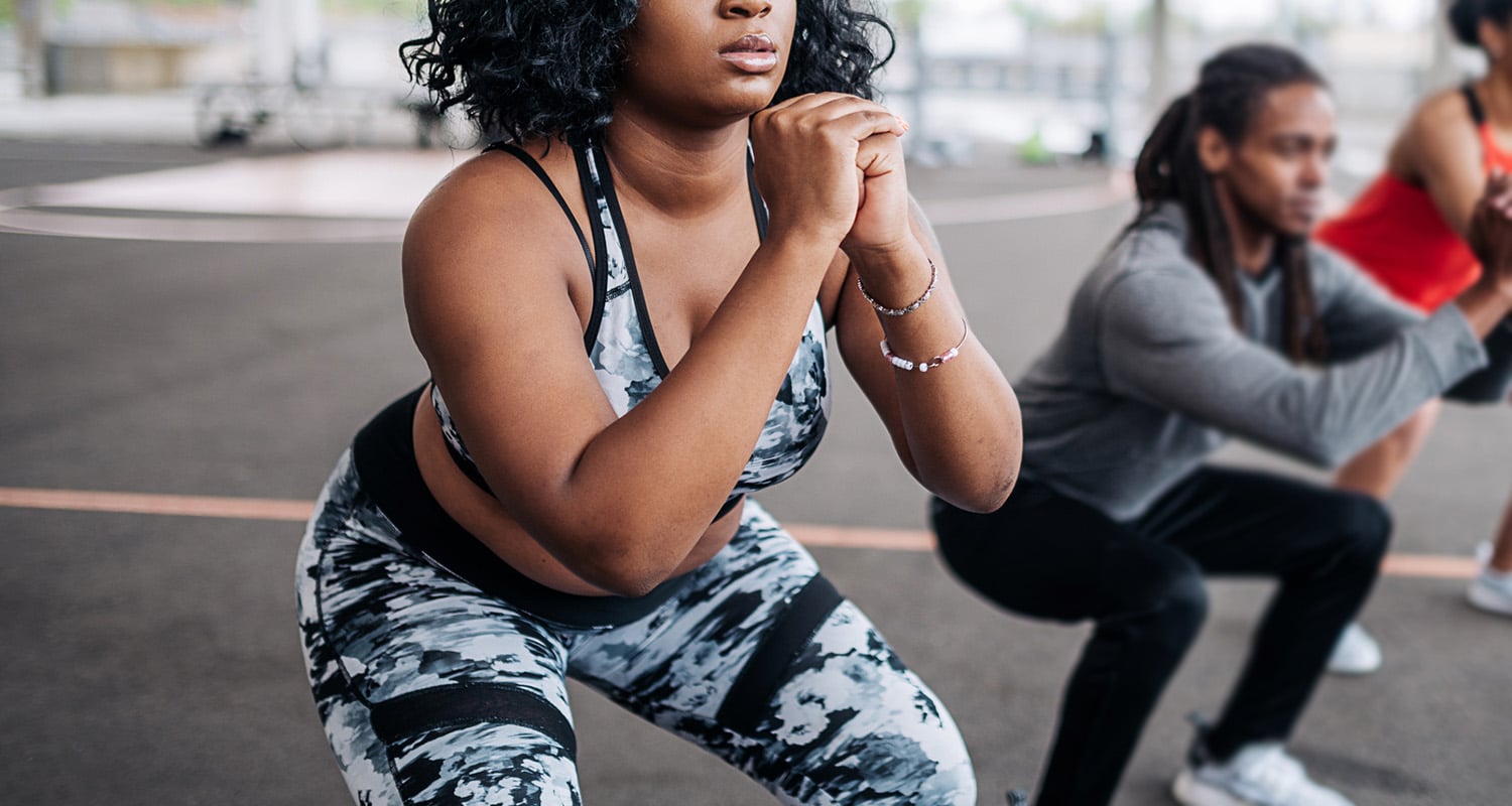 Woman doing bodyweight squat